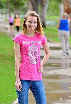 Scrawny young girl flashing her delicate breasts while in public