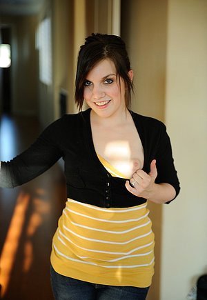 Charismatic babe with dark hair kicking and exposing her boobies too