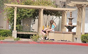 Hot ladies making out and polishing each other\'s pussies in public too