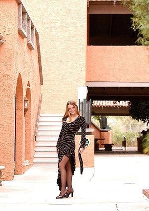 Black stockings beauty exposing her alluring body while in public